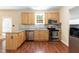 Modern kitchen equipped with stainless steel appliances and tile backsplash at 3819 Valleydale Dr, Durham, NC 27703