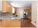 Updated kitchen has stainless appliances, granite counters, and wooden cabinetry at 3819 Valleydale Dr, Durham, NC 27703