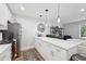Modern kitchen featuring quartz countertops and stainless steel appliances at 3908 Booker Ave, Durham, NC 27713