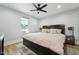 Cozy bedroom with a comfortable bed and stylish decor at 3908 Booker Ave, Durham, NC 27713