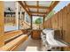 Outdoor grilling station features a built-in grill, sink, wooden bench and privacy fence at 3908 Booker Ave, Durham, NC 27713