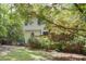 Spacious backyard, featuring a deck and screened porch, perfect for outdoor living at 4 W Bridlewood Trl, Durham, NC 27713