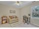 Bright bedroom with a ceiling fan, a couch and a desk at 4 W Bridlewood Trl, Durham, NC 27713