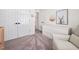 Bedroom featuring modern white dresser and feeding chair with a view to another bathroom at 4112 Riverport Rd, Raleigh, NC 27616