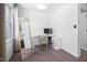 Bright office space with large mirror, computer, chair, and neutral carpet at 4112 Riverport Rd, Raleigh, NC 27616