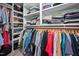 Walk-in closet with custom shelving and hanging racks, providing ample storage at 4112 Riverport Rd, Raleigh, NC 27616