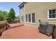 Spacious wood deck with a grill is perfect for outdoor entertaining and relaxation at 4112 Riverport Rd, Raleigh, NC 27616