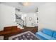 Inviting foyer boasts hardwood floors, staircase with iron spindles, and stylish furnishings at 4112 Riverport Rd, Raleigh, NC 27616