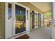 Inviting covered porch with glass paneled door showing house number at 4112 Riverport Rd, Raleigh, NC 27616