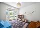 Bright and inviting playroom with large windows, comfortable seating, and organized storage for toys and games at 4112 Riverport Rd, Raleigh, NC 27616