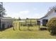 Spacious fenced backyard with pond and shed at 481 Firetower Rd, Louisburg, NC 27549