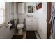A functional bathroom features a toilet, sink and vanity offering all the essentials in a compact, clean design at 481 Firetower Rd, Louisburg, NC 27549