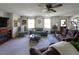 Spacious living room with fireplace, comfortable seating, and natural light, ideal for relaxing or entertaining guests at 481 Firetower Rd, Louisburg, NC 27549