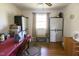 Spare Room with storage furniture, a window, and hardwood floors at 481 Firetower Rd, Louisburg, NC 27549