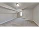 Cozy carpeted bedroom with a window and sloped ceilings at 4828 Forest Highland Dr, Raleigh, NC 27604