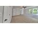 Spacious carpeted bedroom with a ceiling fan and a bright window at 4828 Forest Highland Dr, Raleigh, NC 27604
