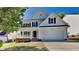 Charming two-story home with a well-manicured lawn and a two-car garage, perfect for Gathering living at 4828 Forest Highland Dr, Raleigh, NC 27604