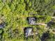 Aerial view showing the property lines of two homesites surrounded by mature trees at 4924 Theys Rd, Raleigh, NC 27606