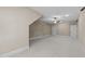Bedroom featuring neutral walls, carpet flooring, and two white doors at 4924 Theys Rd, Raleigh, NC 27606