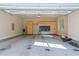 Garage with built-in storage cabinets and ample open space at 4924 Theys Rd, Raleigh, NC 27606