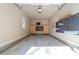 Garage with cabinets provides a space for parking and storage at 4924 Theys Rd, Raleigh, NC 27606