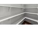 Well-organized pantry with white shelving, providing ample storage space at 4924 Theys Rd, Raleigh, NC 27606