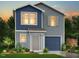 Two-story home featuring blue and gray vinyl siding, well-maintained landscaping, and a covered front entry at 51 Landon Pl, Roxboro, NC 27573