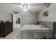Spacious bedroom with closet, neutral carpet, and calming gray walls at 6907 Field Hill Rd, Raleigh, NC 27603