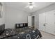 Bright bedroom features a large window, closet space, and stylish furnishings at 6907 Field Hill Rd, Raleigh, NC 27603