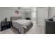 Bedroom features neutral carpet, gray walls, and ensuite bathroom at 6907 Field Hill Rd, Raleigh, NC 27603