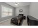 Comfortable bedroom featuring natural light from a window, neutral walls, and ample space at 6907 Field Hill Rd, Raleigh, NC 27603