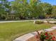 The house across the street with mature trees at 6907 Field Hill Rd, Raleigh, NC 27603