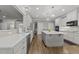 A modern kitchen with stainless steel appliances, and island at 6907 Field Hill Rd, Raleigh, NC 27603