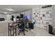 Well-lit living room featuring built-in shelves and ample space for a gaming setup and comfortable seating at 6907 Field Hill Rd, Raleigh, NC 27603