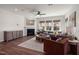 Inviting living room with a cozy fireplace, plush seating, and an open layout for relaxation and entertainment at 716 Ben Ledi Ct, Raleigh, NC 27603