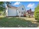 Spacious backyard with lush green grass and a wooden deck at 72 Cokesbury Park Ln, Fuquay Varina, NC 27526