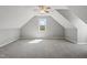 Bedroom featuring plush carpeting, neutral paint, and natural light at 72 Cokesbury Park Ln, Fuquay Varina, NC 27526