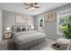 Calm bedroom featuring neutral walls, carpet and bright, natural light at 72 Cokesbury Park Ln, Fuquay Varina, NC 27526