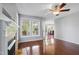 Cozy living room with hardwood floors and view to kitchen and outdoor deck at 72 Cokesbury Park Ln, Fuquay Varina, NC 27526