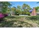 Spacious backyard with a white picket fence bordering the property at 8120 Stillbreeze Dr, Fuquay Varina, NC 27526