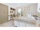 This bedroom features a small built-in desk, soft carpet, and neutral walls at 8120 Stillbreeze Dr, Fuquay Varina, NC 27526