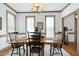 Bright dining room featuring classic decor, neutral walls, and ample natural light at 8120 Stillbreeze Dr, Fuquay Varina, NC 27526