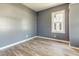 Inviting bedroom featuring wood-look floors and neutral paint at 813 S Franklin St, Rocky Mount, NC 27803