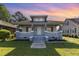 Charming two-story home featuring a welcoming front porch, fresh paint, and a well-maintained lawn at 813 S Franklin St, Rocky Mount, NC 27803