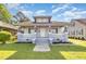 Charming two-story home featuring a welcoming front porch, fresh paint, and a well-maintained lawn at 813 S Franklin St, Rocky Mount, NC 27803