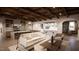 Spacious open-concept living room, adjacent to gourmet kitchen with ample lighting and hardwood floors at 8413 Portmarnock Ct, Wake Forest, NC 27587