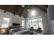 Sun-filled main bedroom with vaulted ceiling, large windows, and neutral décor at 8413 Portmarnock Ct, Wake Forest, NC 27587