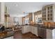 Bright kitchen with stainless steel appliances, granite countertops, and ample cabinet space at 904 Emory Ln, Raleigh, NC 27609