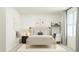 Comfortable bedroom with a neutral color palette, a view from large window and a modern workspace at 10060 Regal Dr # 17, Angier, NC 27501
