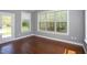 Sunny dining room with large windows and backyard access at 1007 Fairhaven Dr, Mebane, NC 27302
